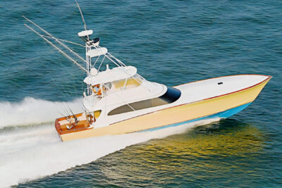 Gratitude, a yellow-hull Spencer sportfishing yacht, underway and viewed from above.