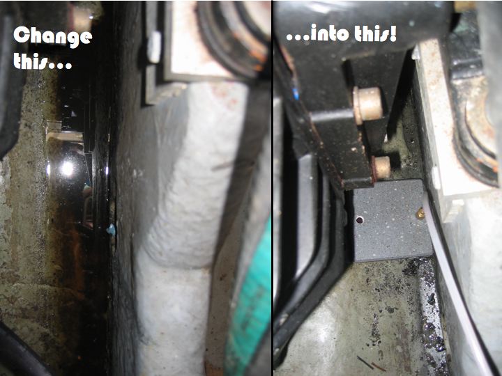 Archived before view of water in a side bilge pocket below the roller and plate assembly; cropped from the original comparison.