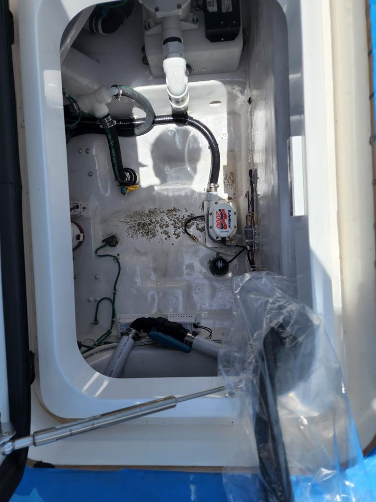 Archived after photograph: White bilge hatch compartment.