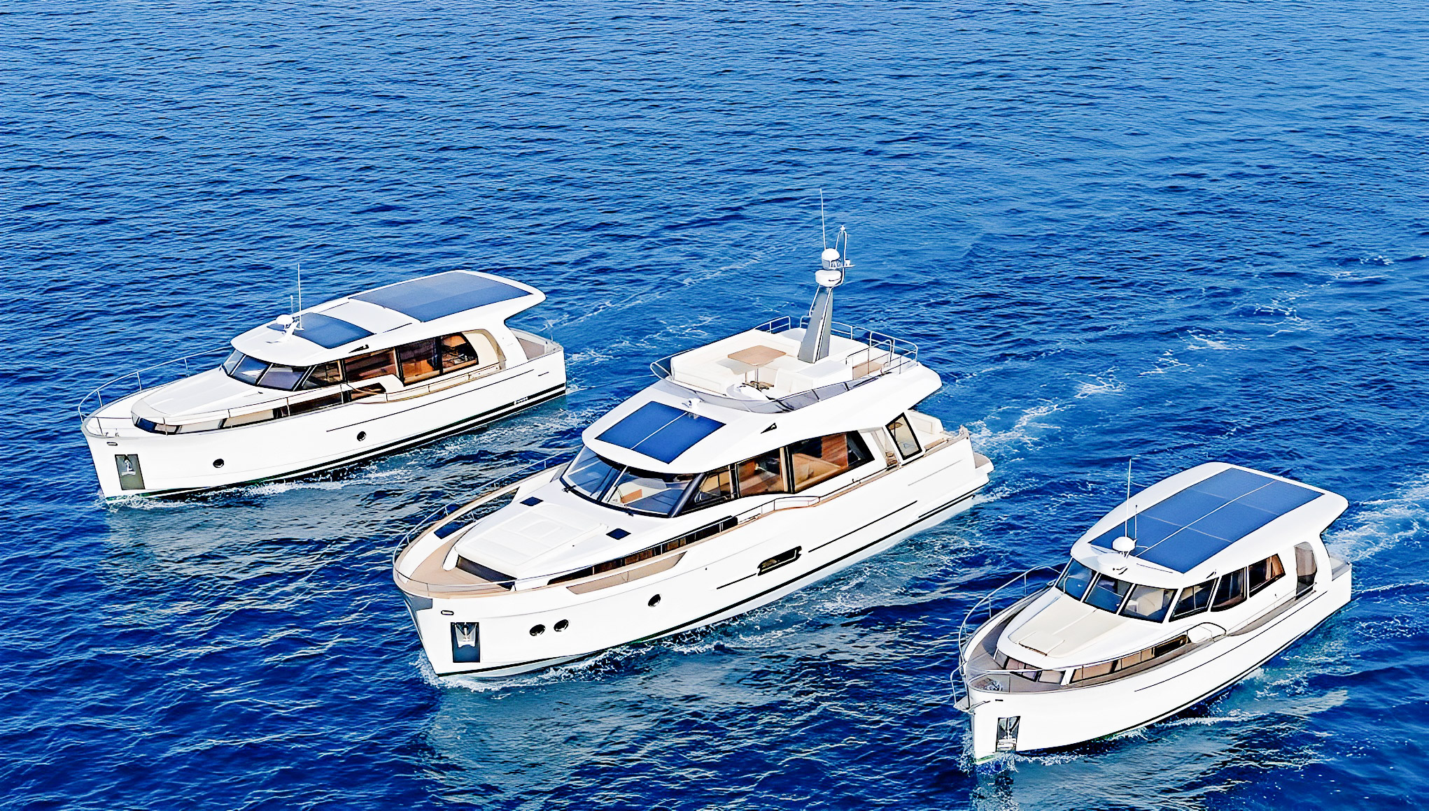 greenline-fleet-original - Arid Bilge Systems - Arid Bilge Systems Three Greenline yachts underway together on blue water.