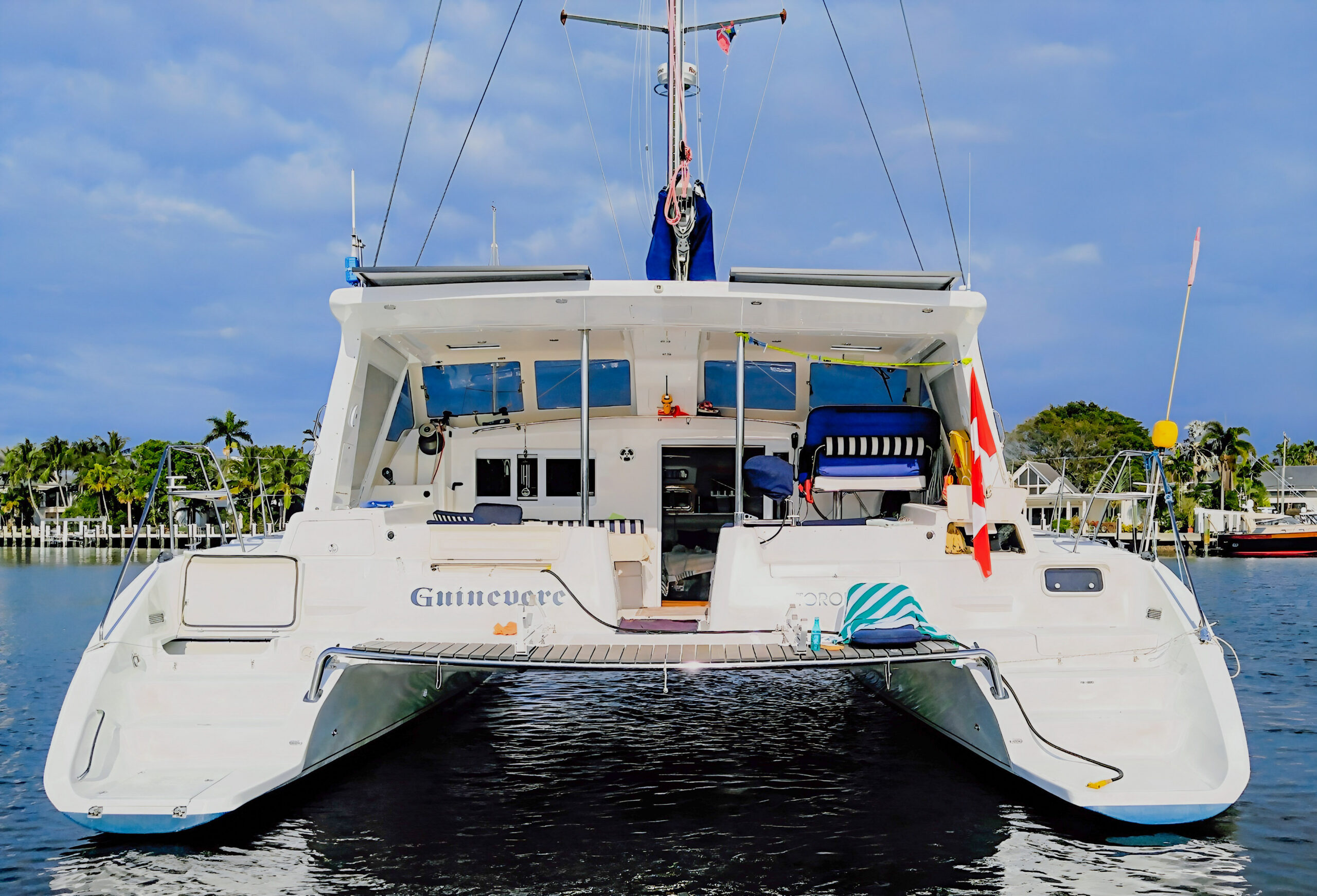 Stern view of Guinevere V showing its two hulls, aft platform and cockpit.