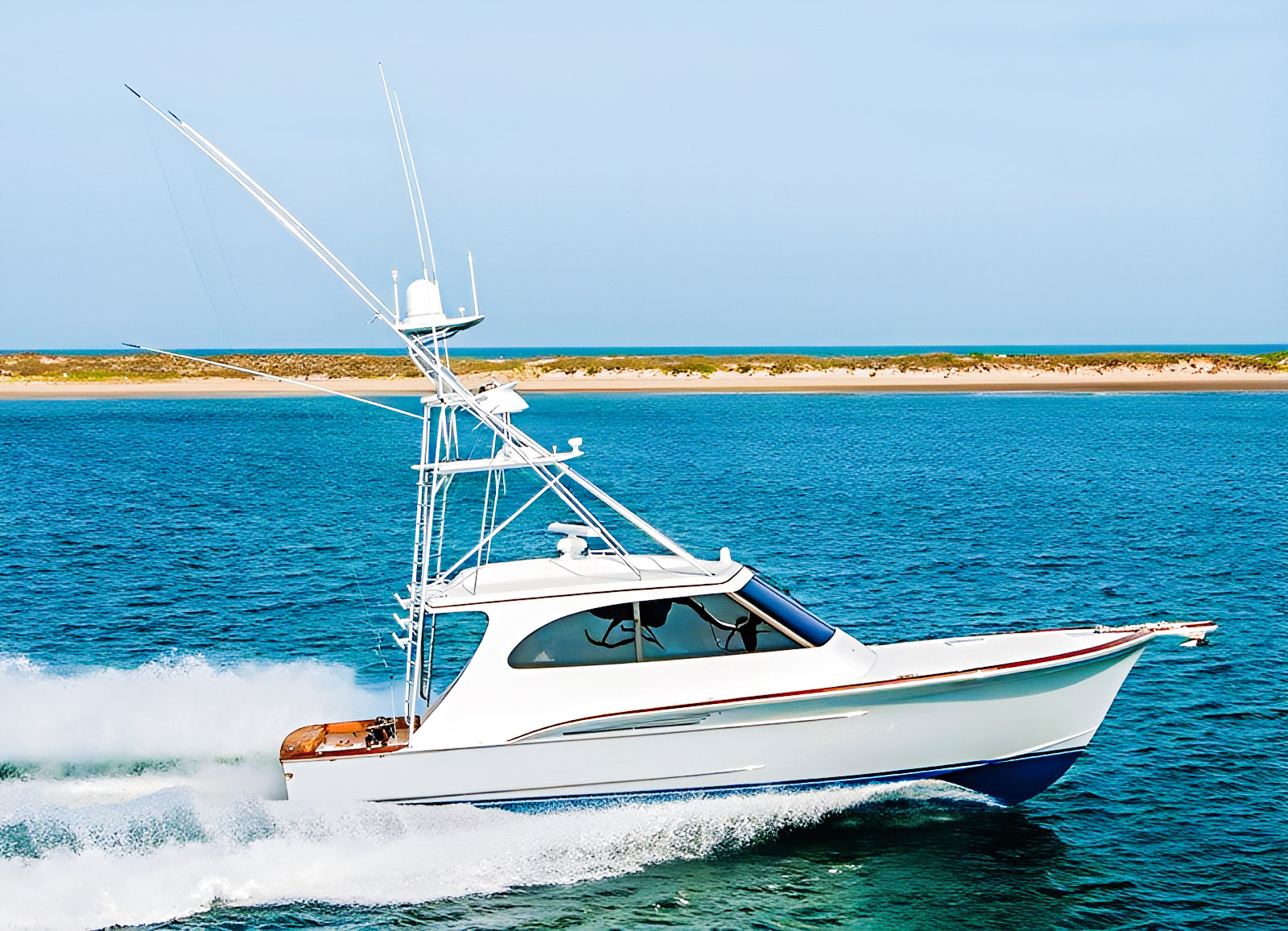 lit-up-jarrett-bay-original-exterior - Arid Bilge Systems Lit Up, a white Jarrett Bay sportfishing boat with a tall tower, underway.